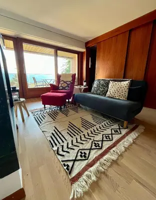 Ein Sitzbereich in der Unterkunft Renovated Apartment 5 min to Crans Montana Center