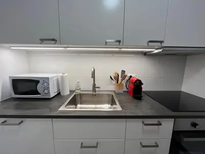 Küche/Küchenzeile in der Unterkunft Renovated Apartment 5 min to Crans Montana Center