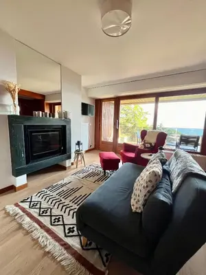 Ein Sitzbereich in der Unterkunft Renovated Apartment 5 min to Crans Montana Center