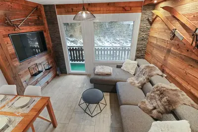 Ein Sitzbereich in der Unterkunft Appartement cosy au centre de la station