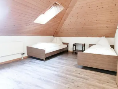 Ein Bett oder Betten in einem Zimmer der Unterkunft Interlaken apartment 27