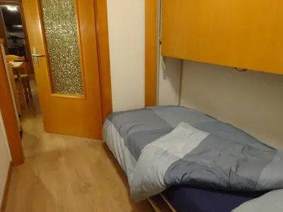 Ein Bett oder Betten in einem Zimmer der Unterkunft The white fox's family home - Veysonnaz