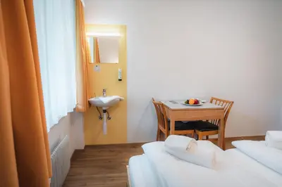 Ein Bett oder Betten in einem Zimmer der Unterkunft B&B Haus Schönstatt contactless- Check-In