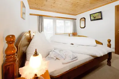 Ein Bett oder Betten in einem Zimmer der Unterkunft Touring Galerie
