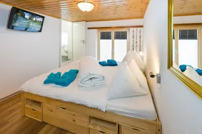 Ein Bett oder Betten in einem Zimmer der Unterkunft Touring Cheminée