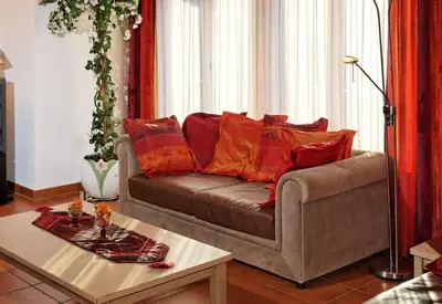 Ein Sitzbereich in der Unterkunft Beny Duplex