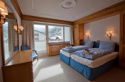 Ein Bett oder Betten in einem Zimmer der Unterkunft Haus Viktoria A, Apartment Blauherd