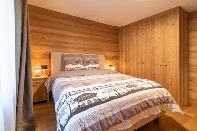 Ein Bett oder Betten in einem Zimmer der Unterkunft Haus Mirador by Zermatt Premium Apartments