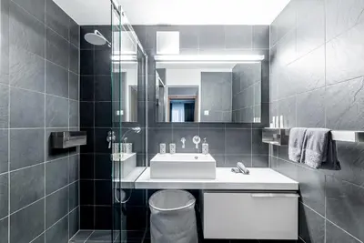 Ein Badezimmer in der Unterkunft Haus Mirador by Zermatt Premium Apartments