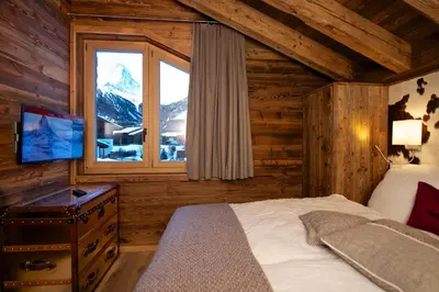 Ein Bett oder Betten in einem Zimmer der Unterkunft Chalet Matterland