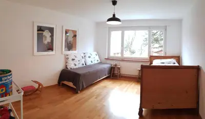 Ein Sitzbereich in der Unterkunft Interlaken City Apartments
