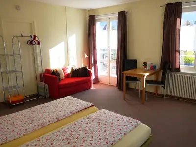 Ein Bett oder Betten in einem Zimmer der Unterkunft ARNOLDS Bed & Breakfast