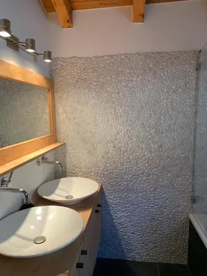 Ein Badezimmer in der Unterkunft K2 Chalet