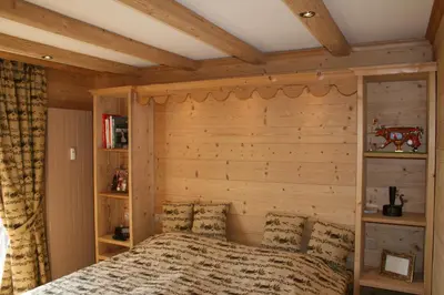 Ein Bett oder Betten in einem Zimmer der Unterkunft Mountain view cosy, comfortable 1 bed-room Luxury Appartment Crans-Montana