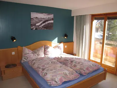Ein Bett oder Betten in einem Zimmer der Unterkunft Appartementhaus Venetz SAAS105