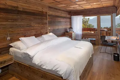 Ein Bett oder Betten in einem Zimmer der Unterkunft Aïda Hôtel & Spa - 