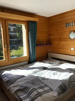 Ein Bett oder Betten in einem Zimmer der Unterkunft La gentiane