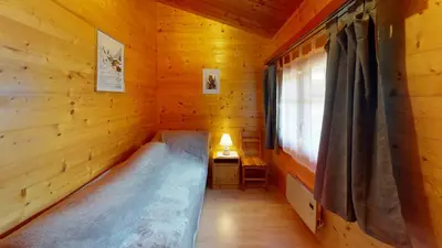 Ein Bett oder Betten in einem Zimmer der Unterkunft Chalet Leonie LE0