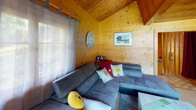 Ein Sitzbereich in der Unterkunft Chalet Leonie LE0