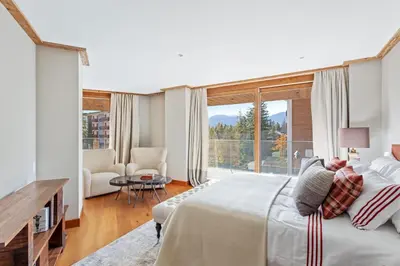 Ein Bett oder Betten in einem Zimmer der Unterkunft Sport Club Residences & Spa