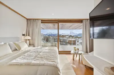 Ein Bett oder Betten in einem Zimmer der Unterkunft Sport Club Residences & Spa