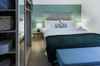 Ein Bett oder Betten in einem Zimmer der Unterkunft Chalet Antoine serviced Apartments by Mirabeau