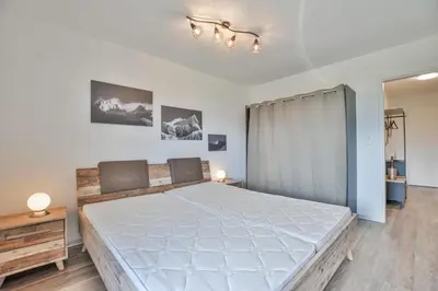 Ein Bett oder Betten in einem Zimmer der Unterkunft Valaisia 134
