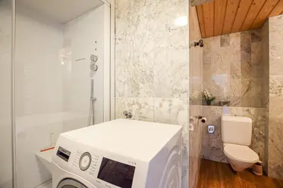 Ein Badezimmer in der Unterkunft Valaisia 125
