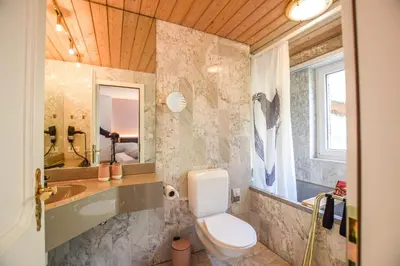 Ein Badezimmer in der Unterkunft Valaisia 125
