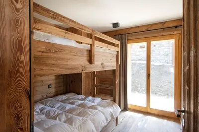 Ein Bett oder Betten in einem Zimmer der Unterkunft Polaris 1 001 - LUXE & SKI LIFT apartment 6 pers