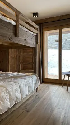 Ein Bett oder Betten in einem Zimmer der Unterkunft Polaris 1 001 - LUXE & SKI LIFT apartment 6 pers