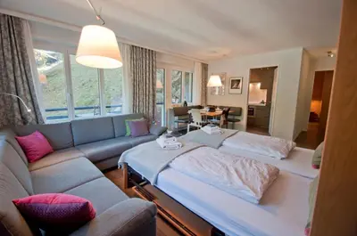 Ein Bett oder Betten in einem Zimmer der Unterkunft Haus Bodmen C, Apartment Edelweiss