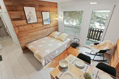 Ein Bett oder Betten in einem Zimmer der Unterkunft Appartement en plein centre de Crans Montana