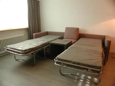 Ein Sitzbereich in der Unterkunft Brunegghorn 4