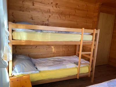 Ein Bett oder Betten in einem Zimmer der Unterkunft Chalet Valeria