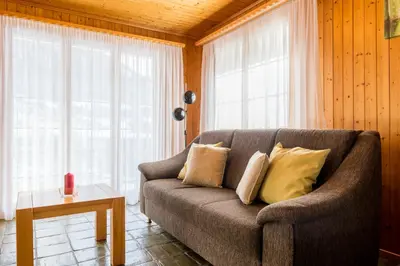 Ein Sitzbereich in der Unterkunft Chalet Sunnegga