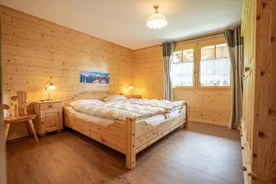 Ein Bett oder Betten in einem Zimmer der Unterkunft Chumma Duplex