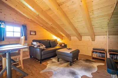 Ein Sitzbereich in der Unterkunft Chumma Duplex