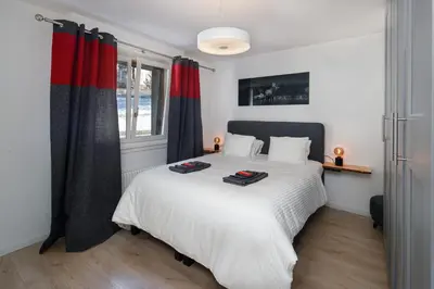 Ein Bett oder Betten in einem Zimmer der Unterkunft Magnifique appartement proche du centre et du ski