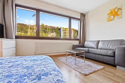 Ein Sitzbereich in der Unterkunft Studio cosy au centre de Crans-Montana