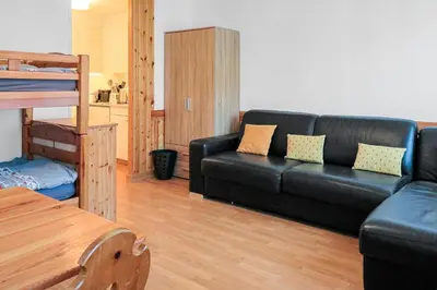 Ein Sitzbereich in der Unterkunft Studio cosy au centre de Crans-Montana (1-4 personnes)