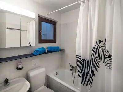 Ein Badezimmer in der Unterkunft Avalon