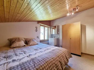 Ein Bett oder Betten in einem Zimmer der Unterkunft L'Oree Penthouse