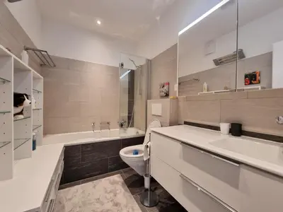 Ein Badezimmer in der Unterkunft L'Oree Penthouse