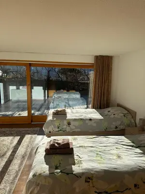 Ein Bett oder Betten in einem Zimmer der Unterkunft Chalet à Savièse en bordure de forêt