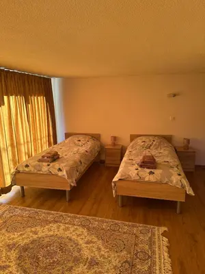 Ein Bett oder Betten in einem Zimmer der Unterkunft Chalet à Savièse en bordure de forêt
