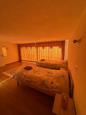 Ein Bett oder Betten in einem Zimmer der Unterkunft Chalet à Savièse en bordure de forêt