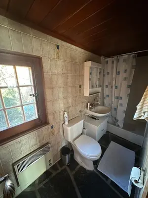 Ein Badezimmer in der Unterkunft Chalet à Savièse en bordure de forêt