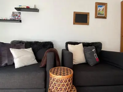 Ein Sitzbereich in der Unterkunft Haus Alpalin - adjacent studios 'Mischabel', cosy, central