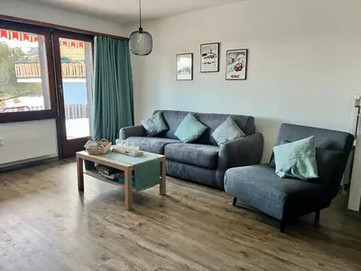 Ein Sitzbereich in der Unterkunft 2,5 pièces à Haute-Nendaz, grande terrasse, piscine, sauna, tennis